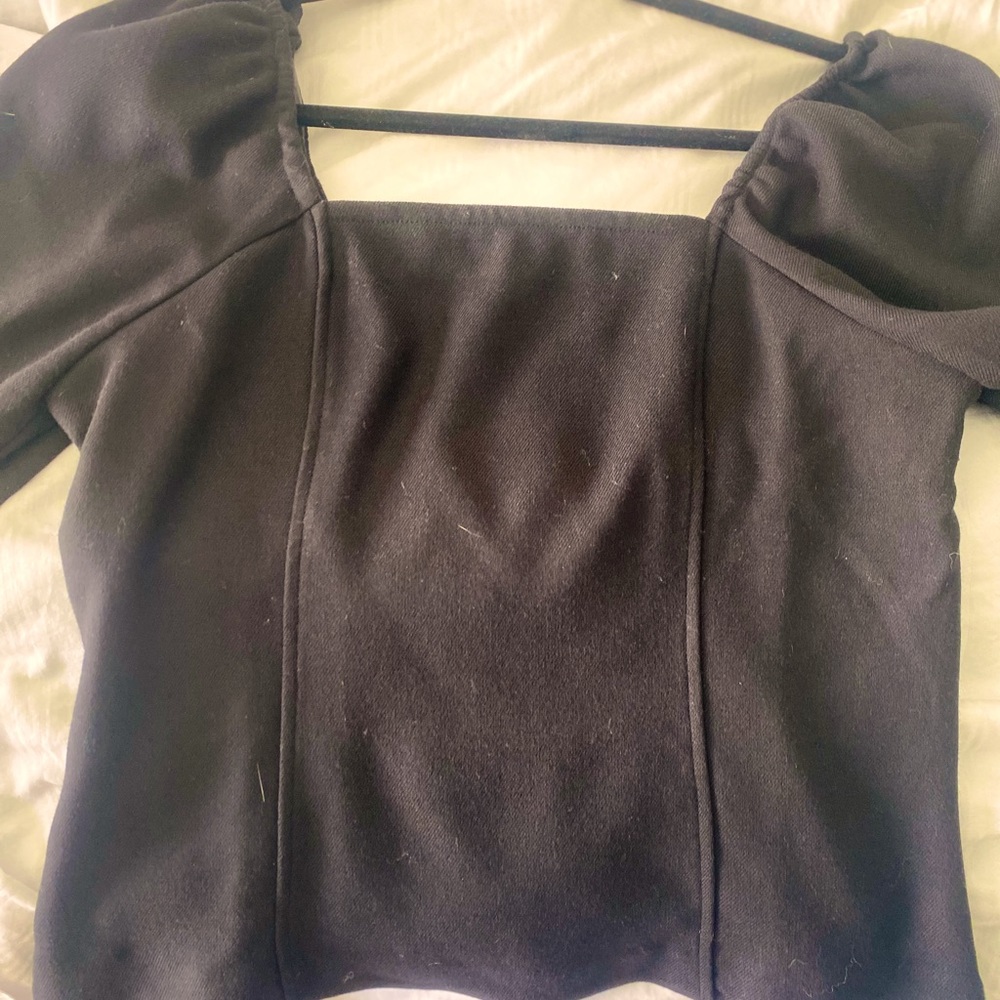 Brand New versatile, black top perfect for work or Friday nights!